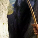 Illustration for article titled Insane slackliner crosses 660-meter gorge without safety, then jumps